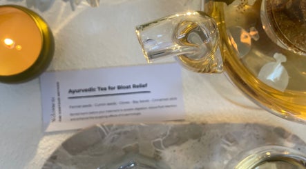 Herbal tea arrangement with candle at The Contour Method, Melbourne, Victoria, AU for relaxation.