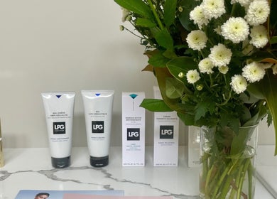 Beauty products and flowers at The Contour Method, Melbourne, Victoria, AU, showcasing elegance and care.