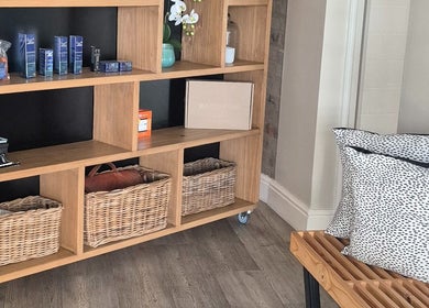 Stylish shelving at Equilibrium Beauty Salon, Cape Town, Western Cape, ZA, showcasing products and decor.