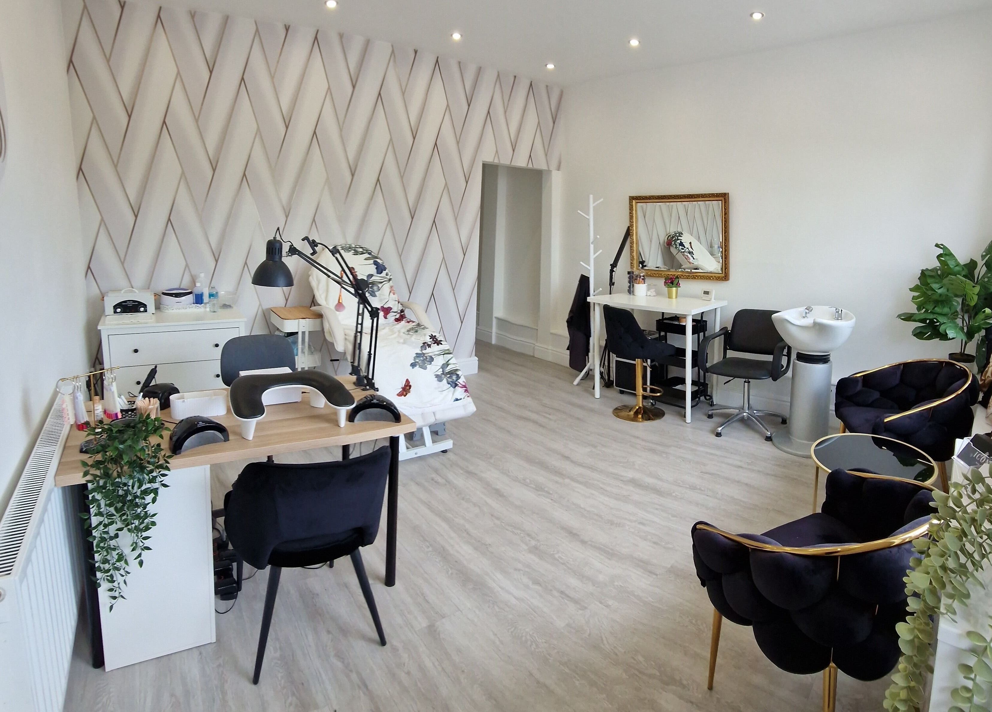 Bright, stylish interior of Beautiful Swan Studio, Swinton, England, GB with manicure and styling stations.