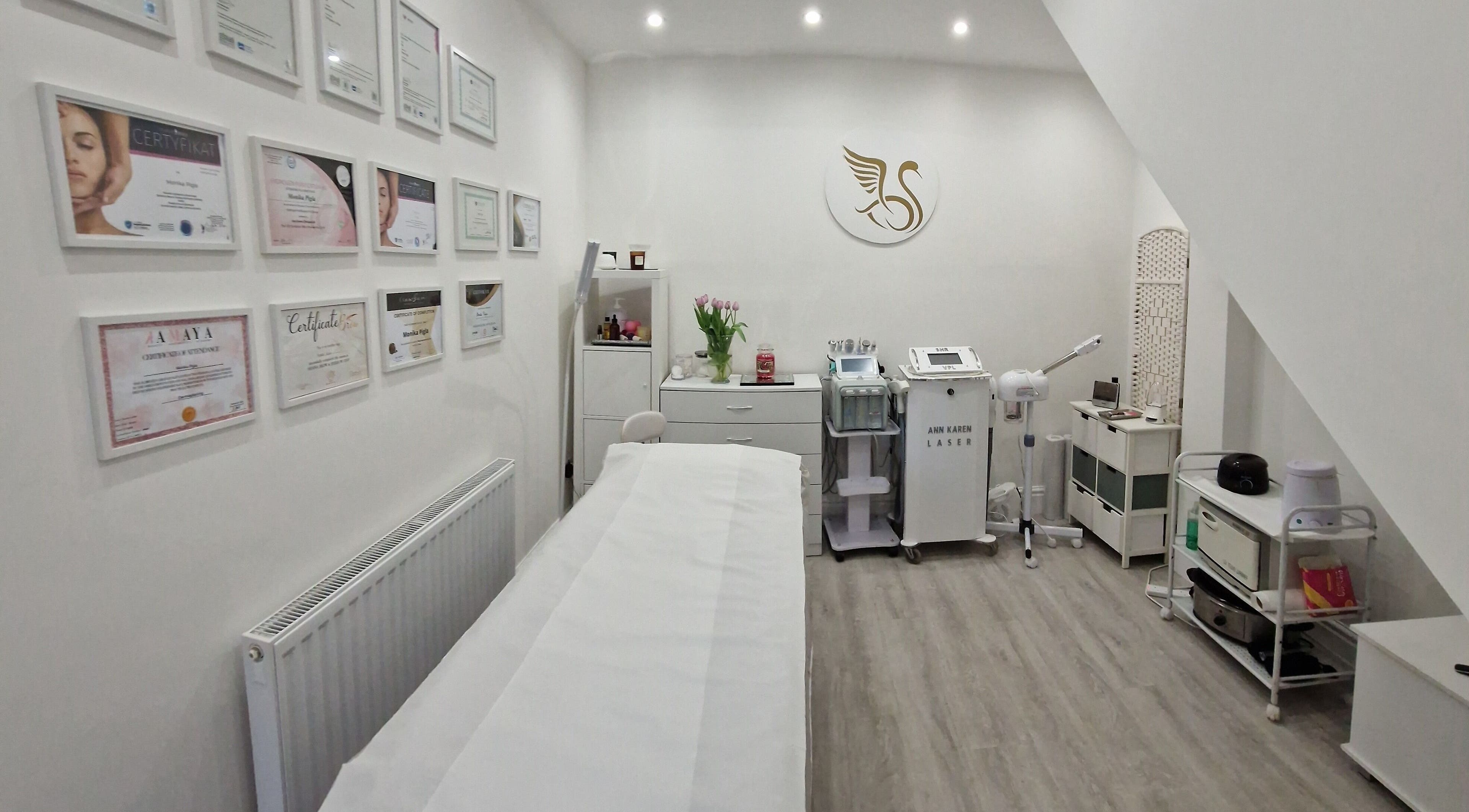 Beautiful Swan Studio in Swinton, England, GB, showcasing a serene beauty treatment room with elegant decor.