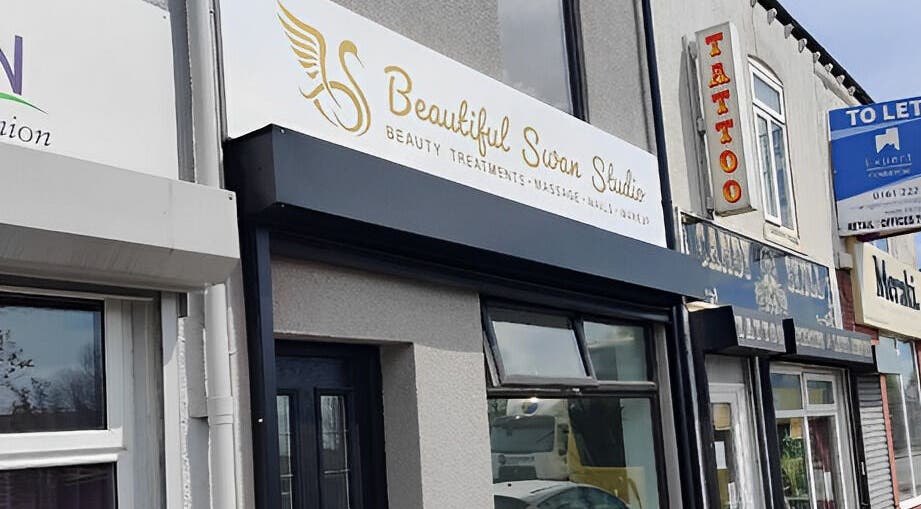 Exterior view of Beautiful Swan Studio sign, Swinton, England, GB showcasing beauty and wellness services.
