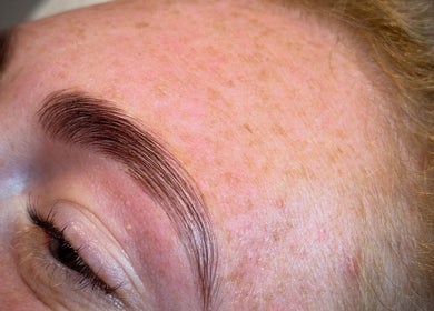Close-up of expertly shaped eyebrows at Chloe Louise Beauty in Lossiemouth, Scotland, GB.