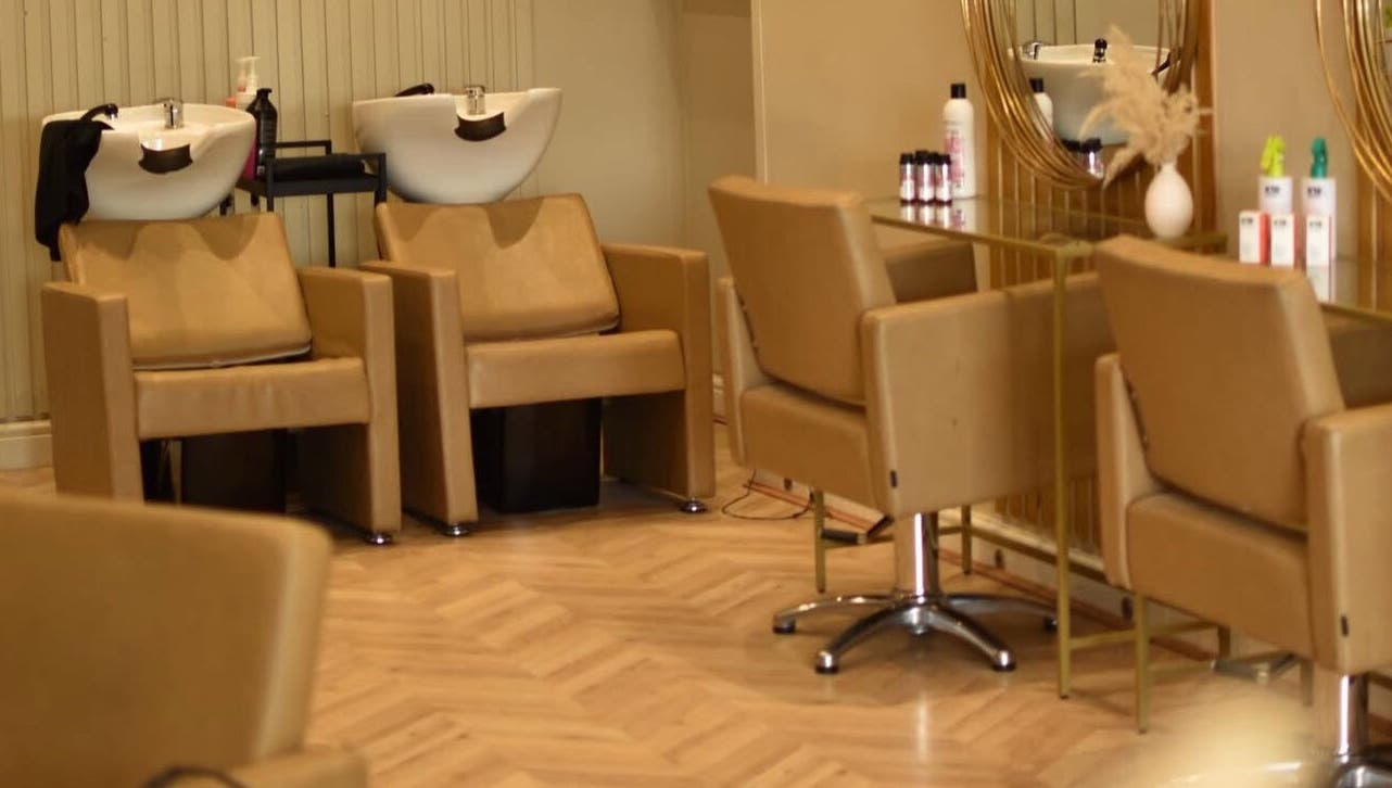Stylish salon chairs and wash basins at hair by lilybelle, Wallasey, England, GB.