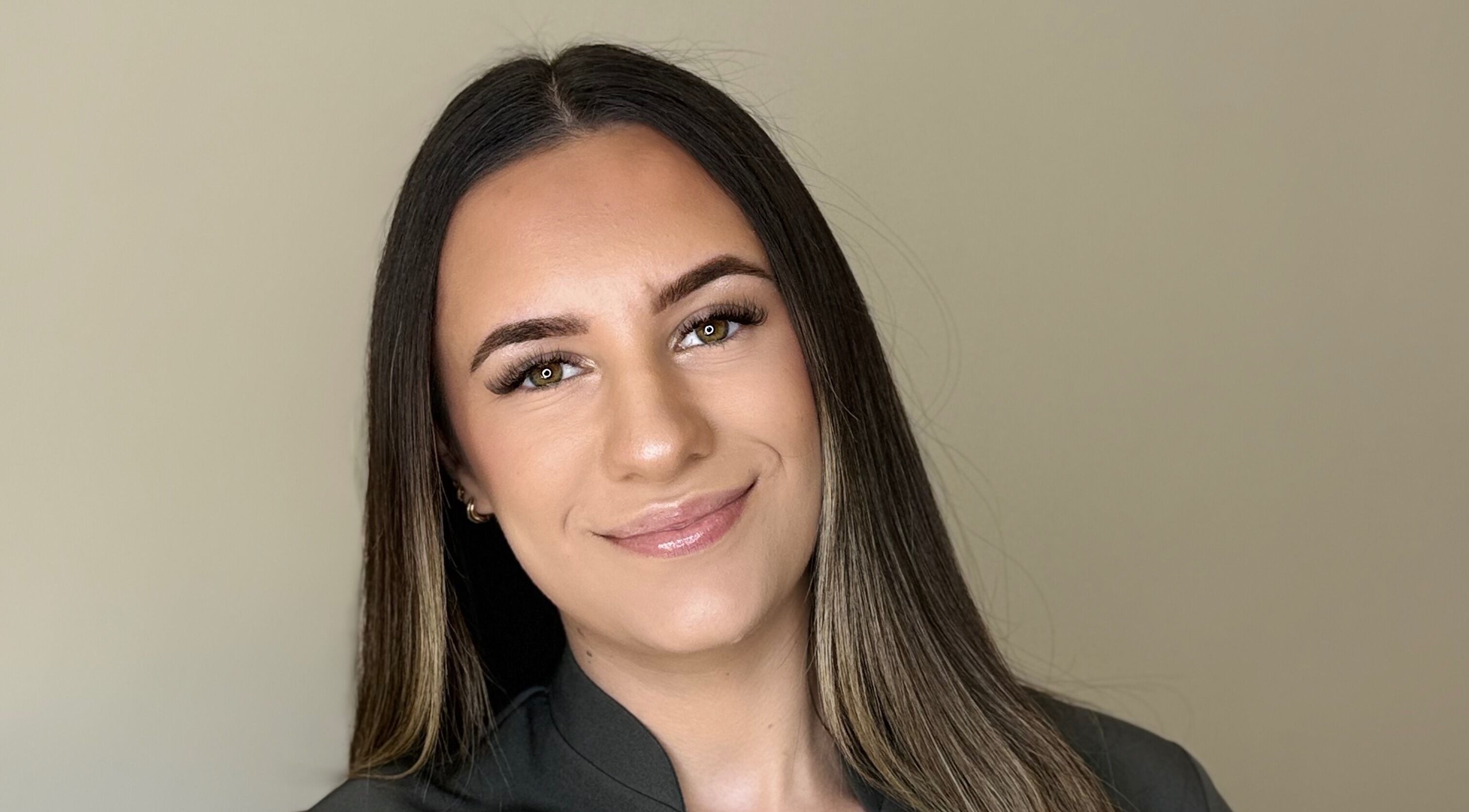 Guest at Bee Smooth Beauty, Tonbridge, England, GB, showcasing a serene smile.