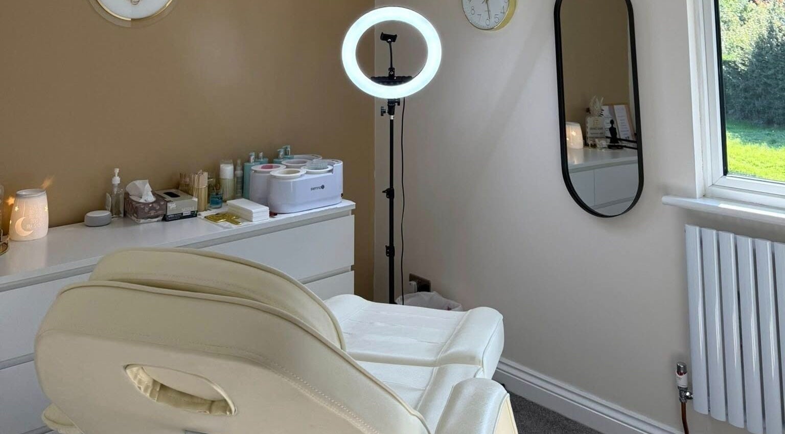 Cozy treatment room at Bee Smooth Beauty in Tonbridge, England, GB featuring a professional setup.