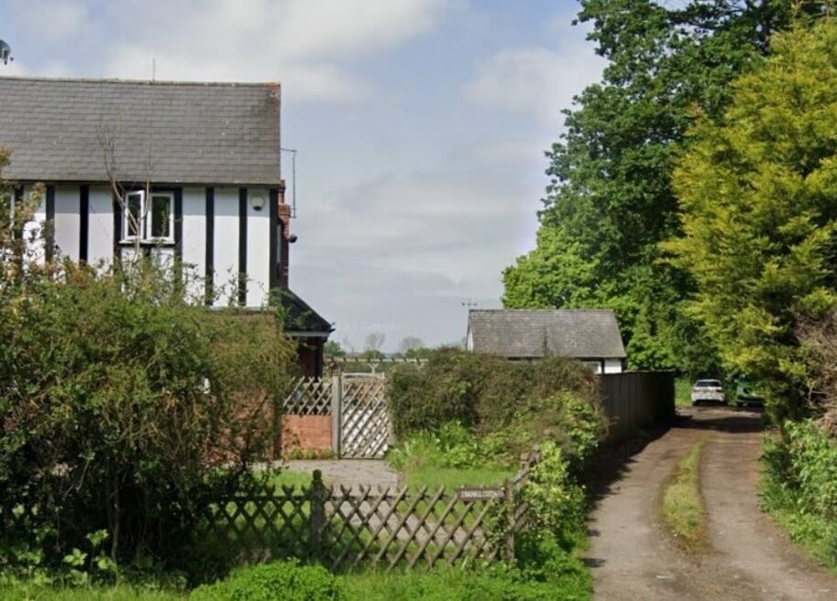 Charming countryside home near Bee Smooth Beauty, Tonbridge, England, GB amidst lush greenery.