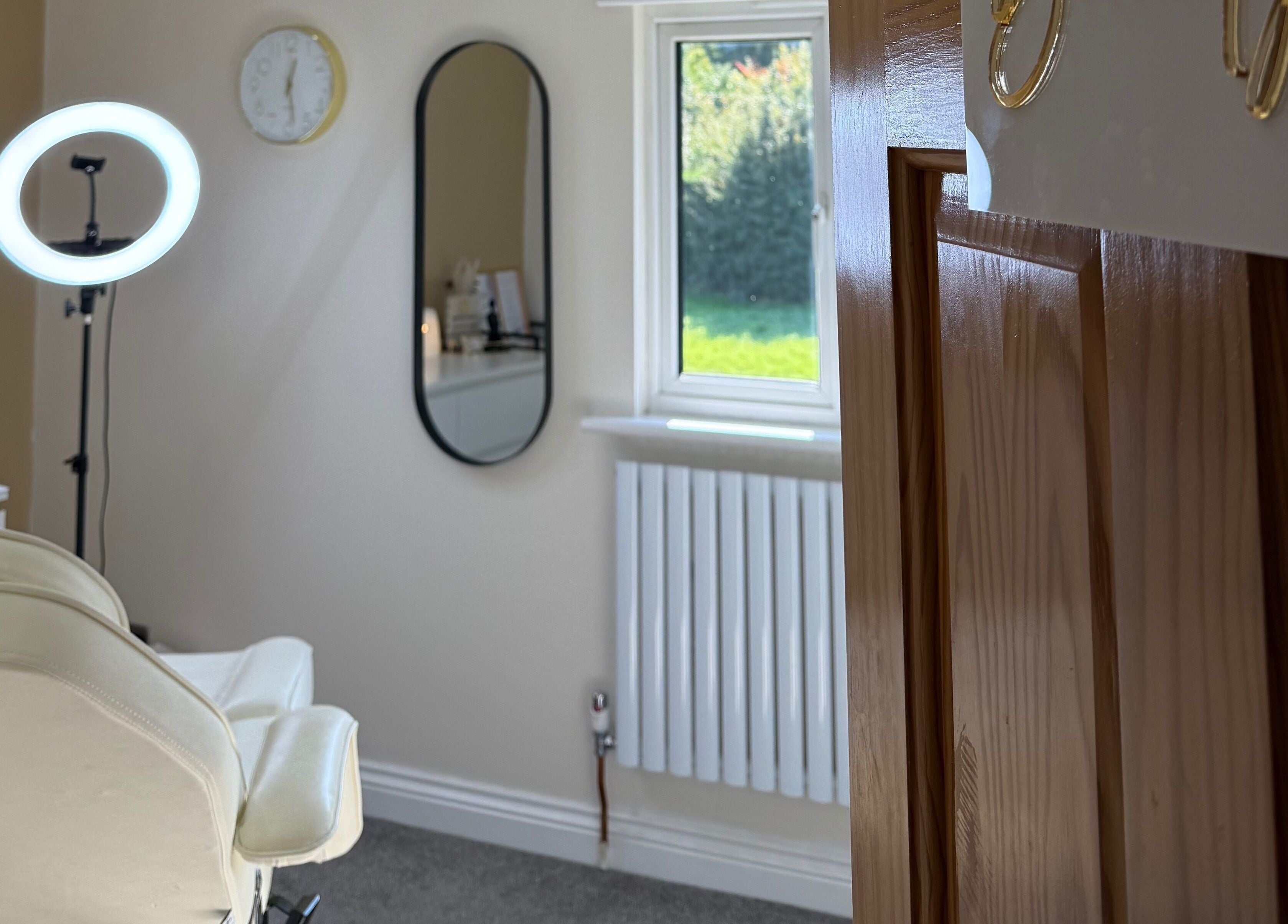Tranquil beauty room with ring light at Bee Smooth Beauty in Tonbridge, England, GB.
