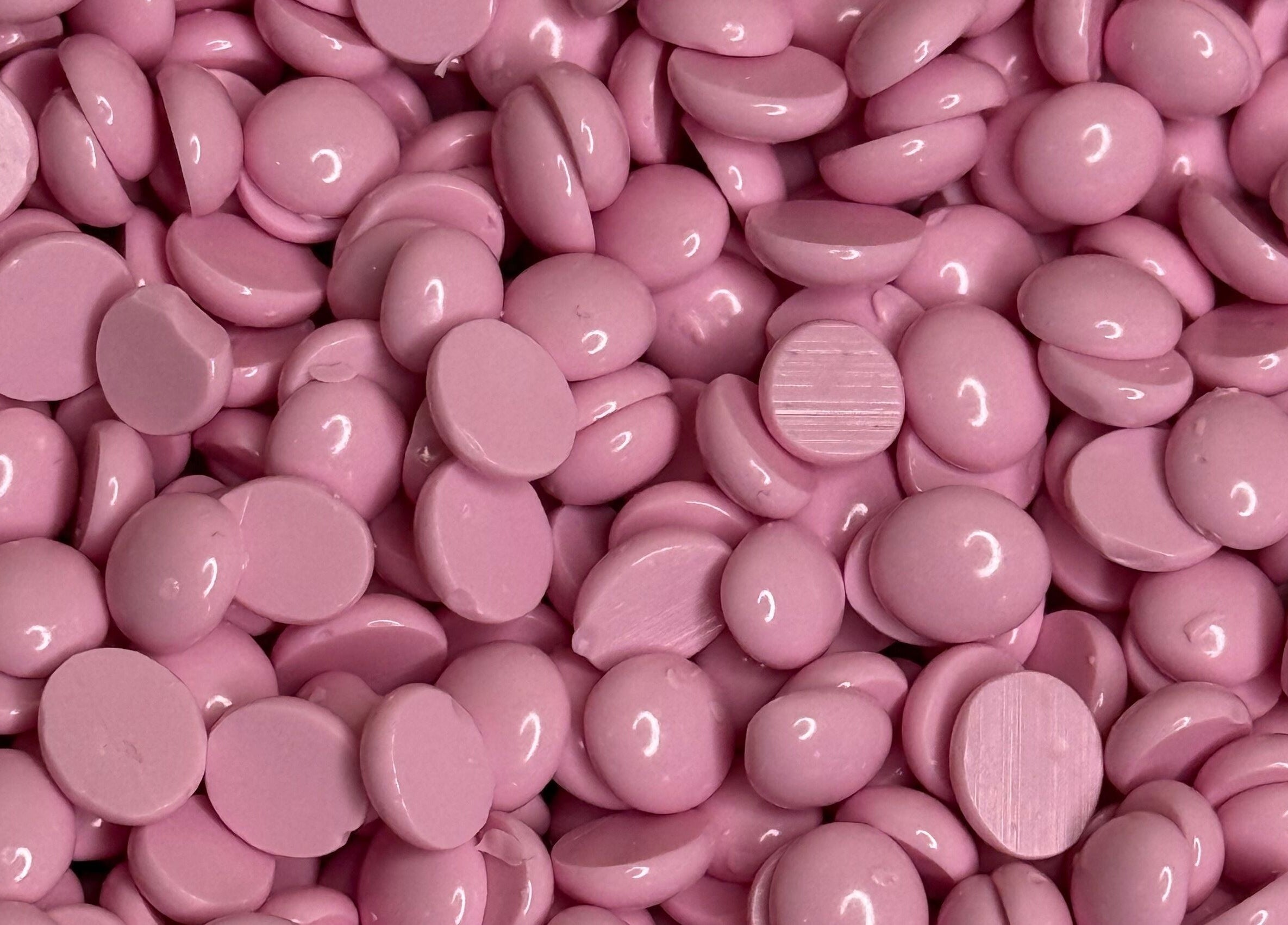 Pink waxing beads at Bee Smooth Beauty, Tonbridge, England, GB, ideal for smooth skin treatments.