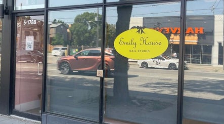 Front entrance of Emily House Nail on Avenue rd, North York, Ontario, CA with a modern glass design.