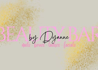 Logo van BeautyBar by Dyanne, Zandvoort, Noord-holland, NL met gouden en roze details.