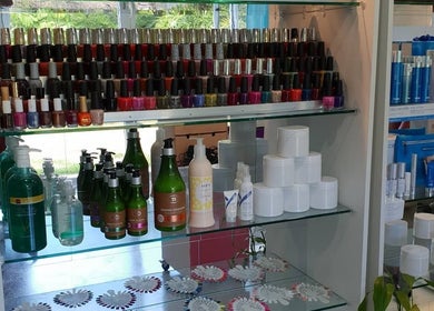 Nail polish and beauty products at Touch of Grace Beauty, Morningside, Queensland, AU. Vibrant colors and sleek bottles.