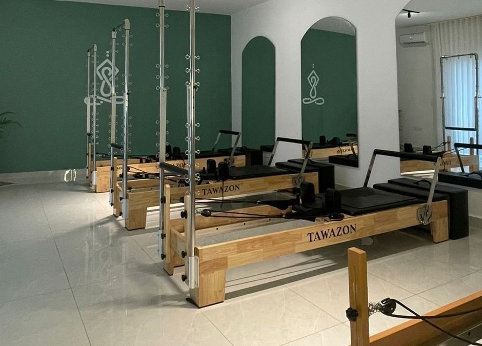 Pilates reformers in Tawazon Studio, Tarablus, North Governorate, LB, offering a tranquil workout environment.