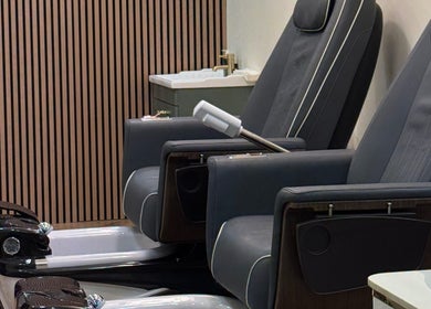 Elegant pedicure chairs at TWO COATS, offering relaxation in Glasgow, Scotland, GB.