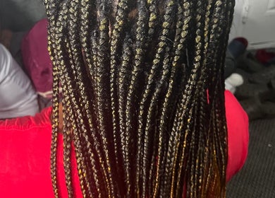 Detailed view of stunning braids at HairLuxe by Chinygold, Leeds, England, GB, showcasing expert craftsmanship.