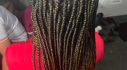 Detailed view of stunning braids at HairLuxe by Chinygold, Leeds, England, GB, showcasing expert craftsmanship.