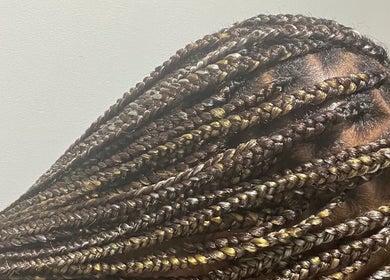 Intricate braided hairstyle at HairLuxe by Chinygold, Leeds, England, GB, showcasing expert hair design.