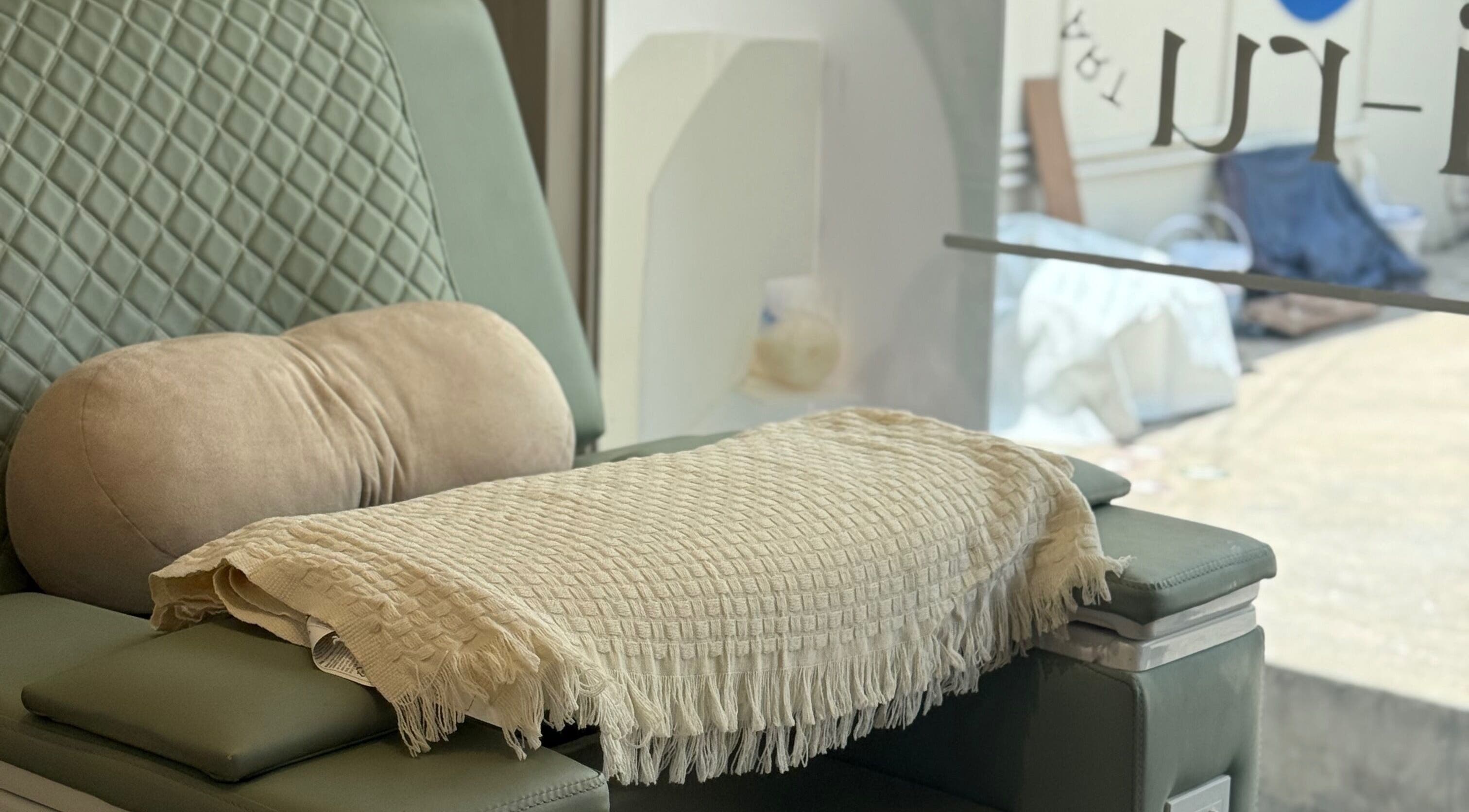 Cozy lounge chair at Ne-I-Ru in กรุงเทพมหานคร, TH, perfect for relaxation.