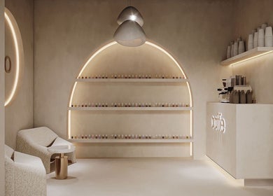 Serene interior of Golden Glow Beauty Home Services in Dubai, Dubai, AE with modern seating and ambient lighting.