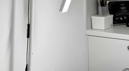 Sleek workspace at Jasmine_lashsyd, West Ryde, New South Wales, AU, showcasing minimalist design and beauty tools.