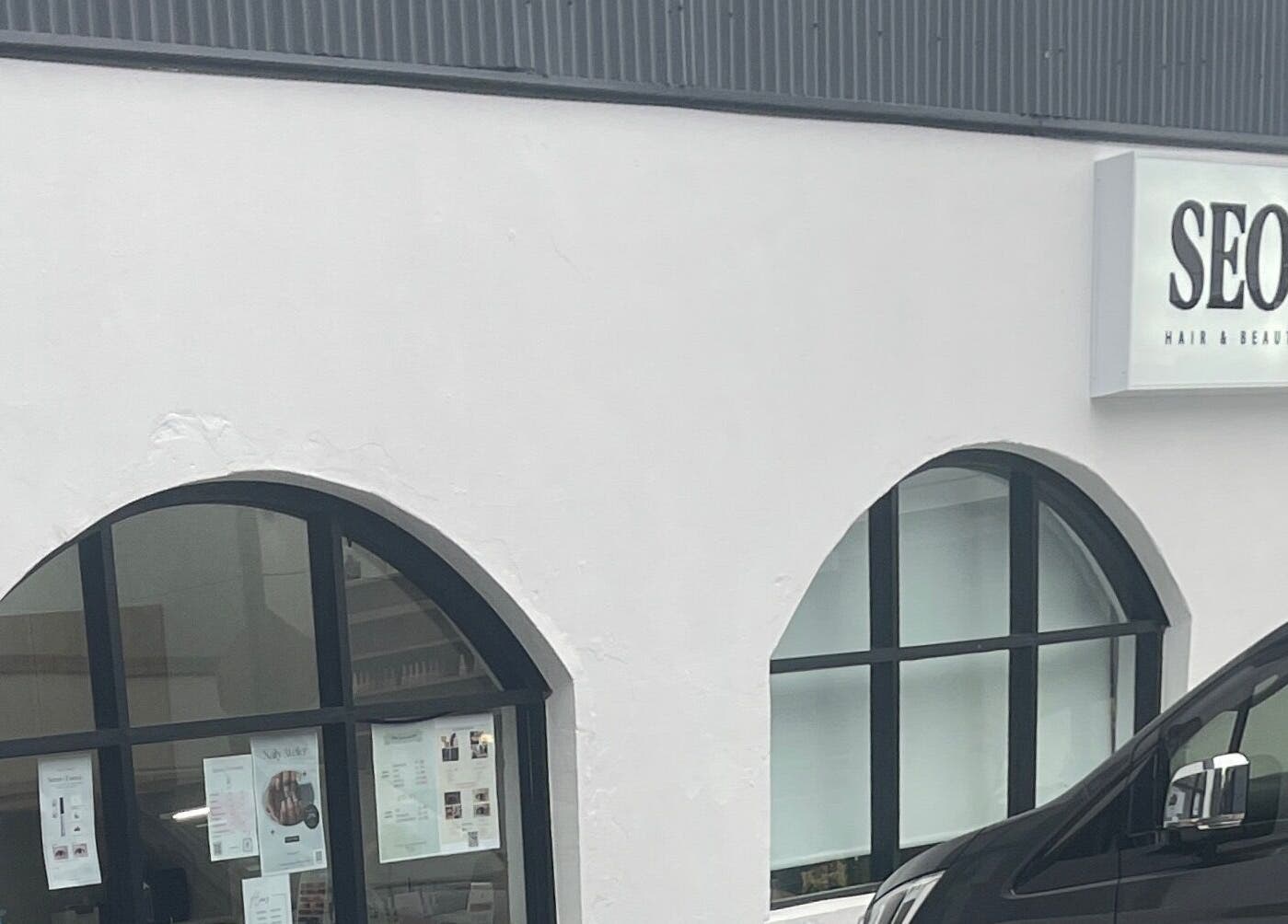 Front view of Jasmine Lashsyd, a beauty studio in West Ryde, New South Wales, AU with stylish arched windows.