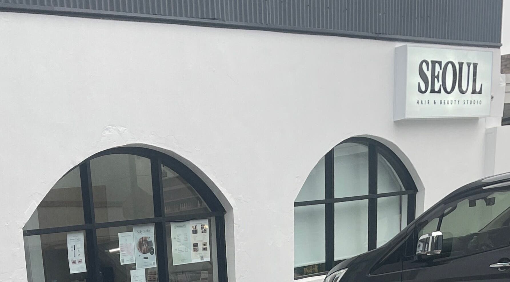 Front view of Jasmine Lashsyd, a beauty studio in West Ryde, New South Wales, AU with stylish arched windows.