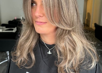Stylish layered haircut by Colbydoeshair @ Salon Twenty Two, Darlington, England, GB. Elegant salon setting in view.