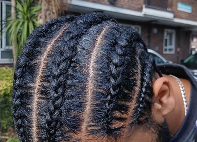 Close-up of intricate cornrows at Braids by Kki, London, England, GB.