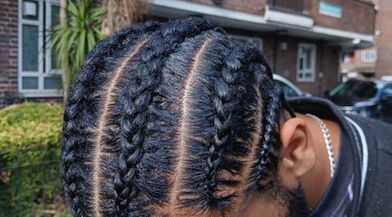 Close-up of intricate cornrows at Braids by Kki, London, England, GB.