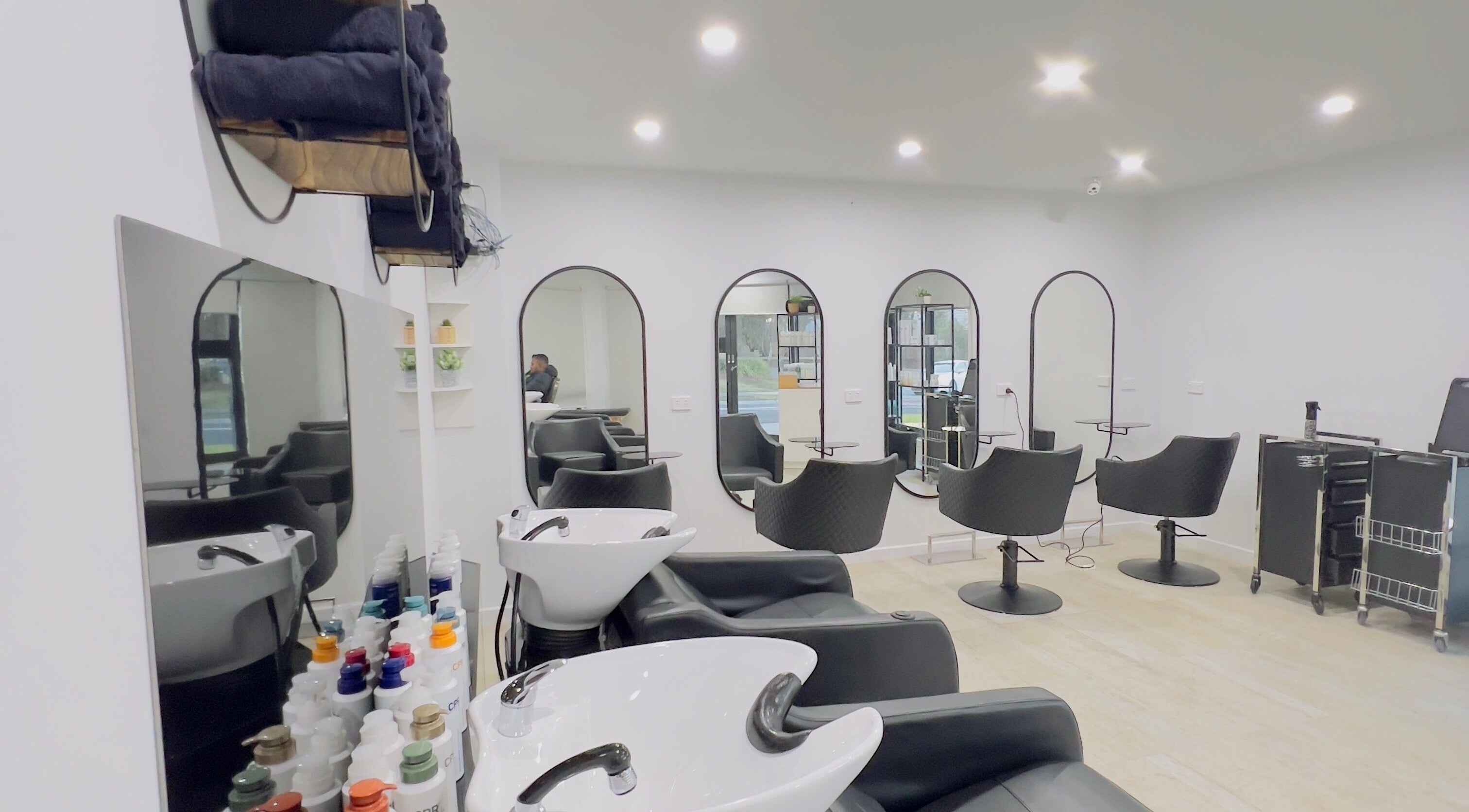 Elegant salon setup at Kondethestylist, Melbourne, Victoria, AU with stylish chairs and modern decor.