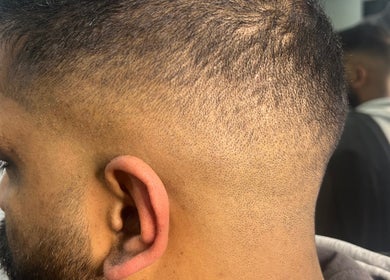 Close-up of sleek fade haircut at Kondethestylist in Melbourne, Victoria, AU, showcasing precision and style.