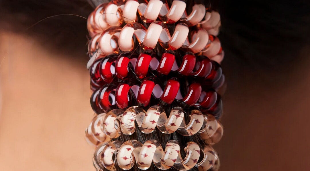 Colorful coiled hair ties at Block 7 Salon, Al Kuwayt, Al Asimah Governate, KW, enhancing hair styling.