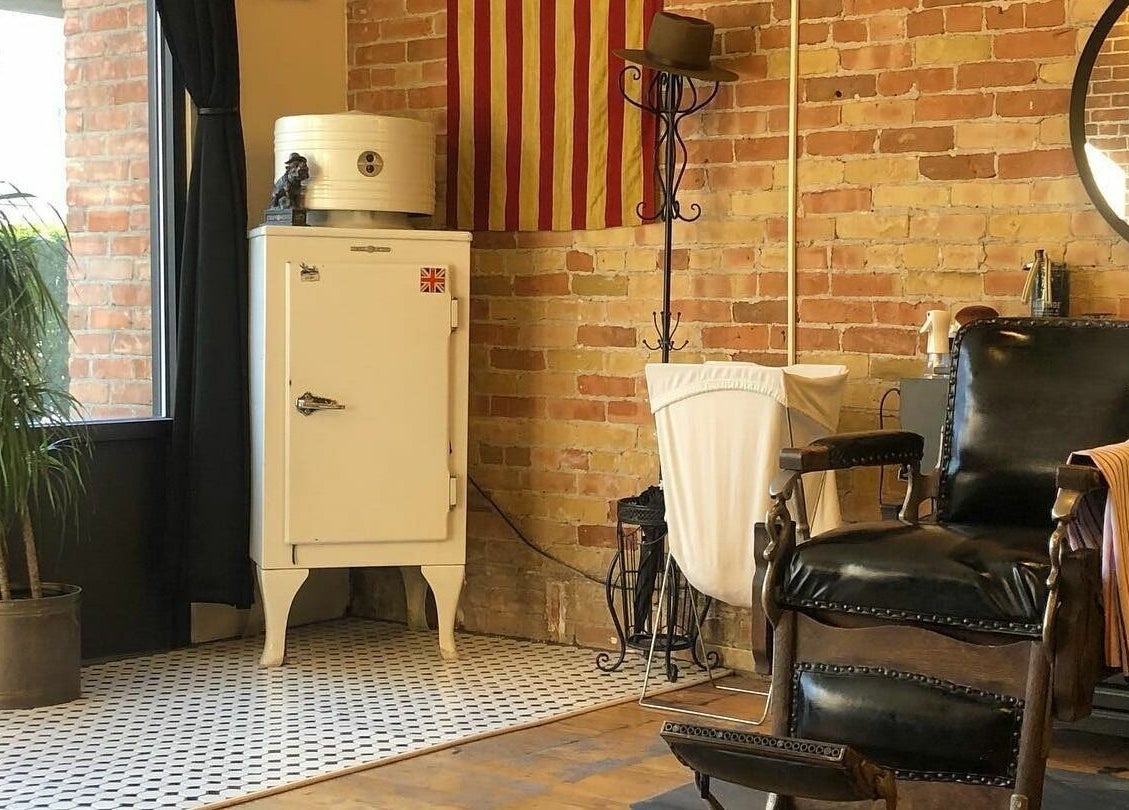 Charming interior of The Man Barber LLC with vintage chair in Provo, Utah, US.