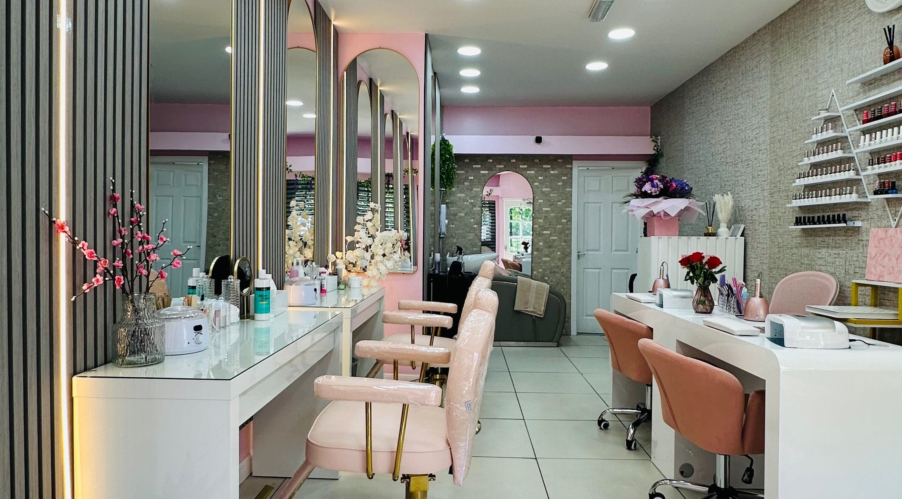 Interior of Avyonae Beauty salon in Glasgow, Scotland, GB showcasing elegant chairs and beauty products.