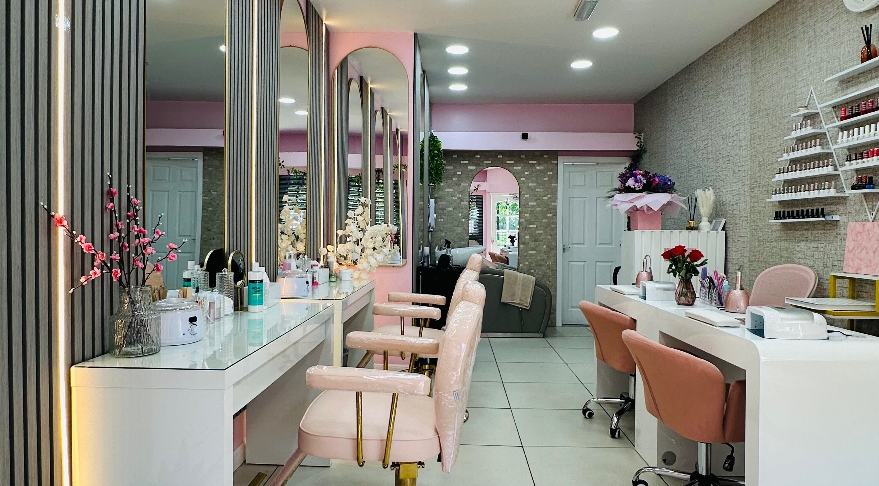 Interior of Avyonae Beauty salon in Glasgow, Scotland, GB showcasing elegant chairs and beauty products.