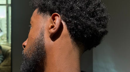 Close-up of a trendy haircut at Sage Men's Salon, አዲስ አበባ, አዲስ አበባ, ET with precise detailing.
