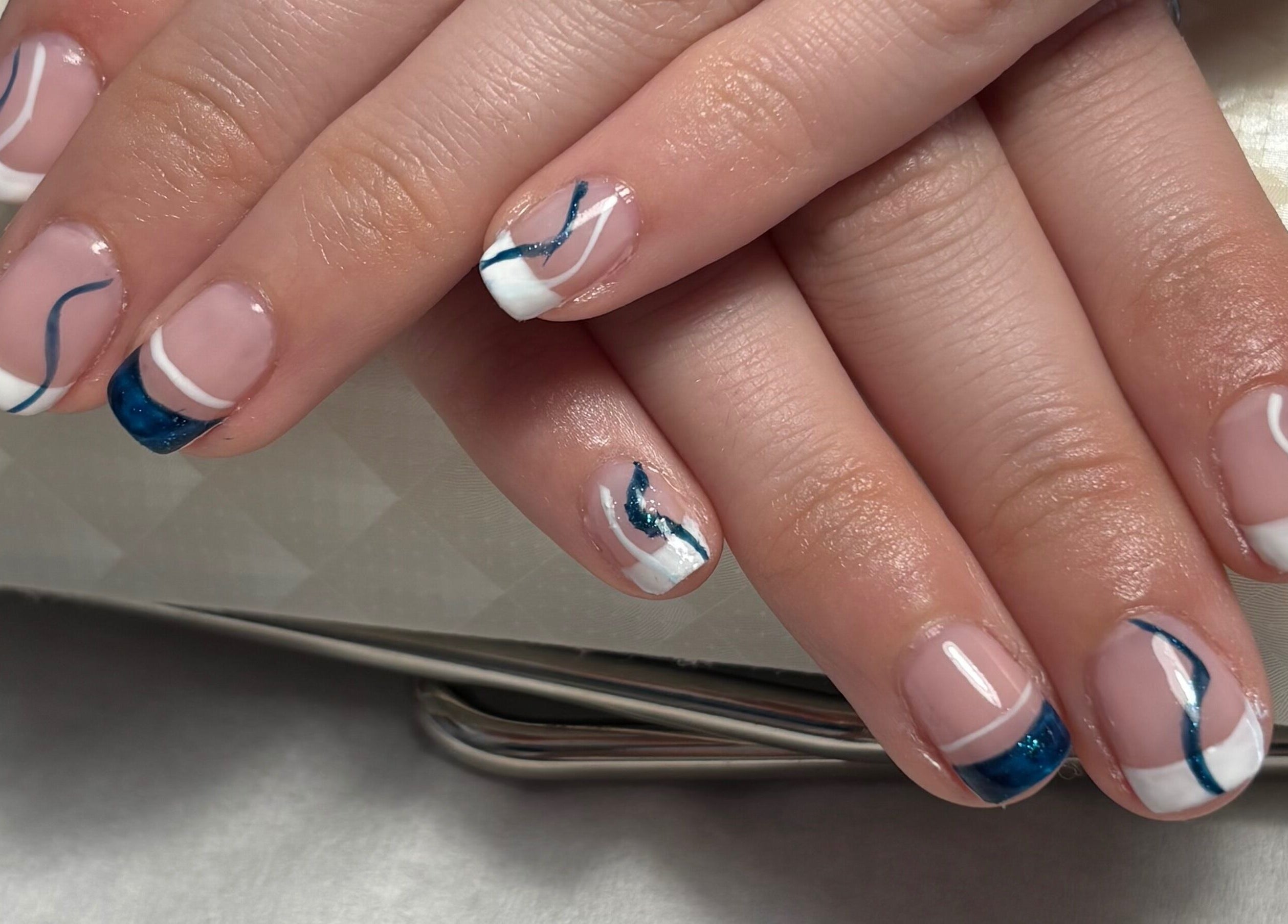 Stylish nail art at Beauty By Gracy in Mallow, County Cork, IE. Featuring navy and white designs.