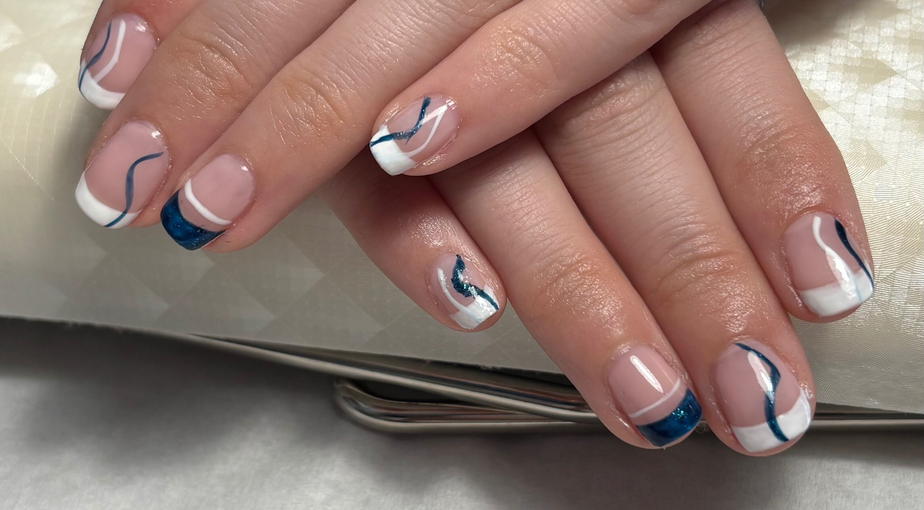 Stylish nail art at Beauty By Gracy in Mallow, County Cork, IE. Featuring navy and white designs.