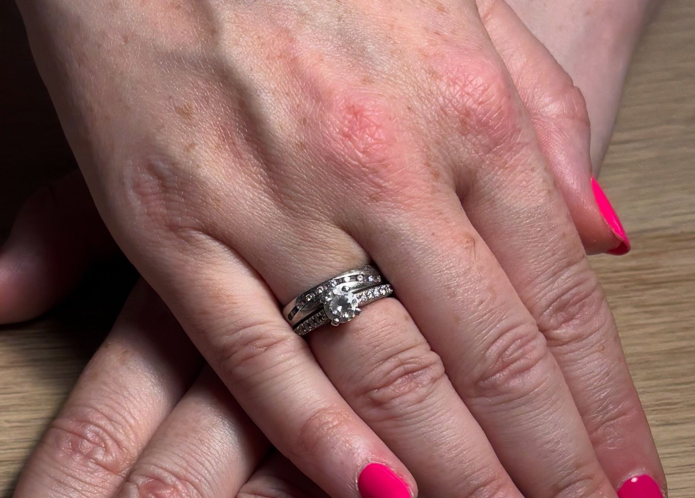 Elegant hand with pink nails and a diamond ring at Beauty By Gracy, Mallow, County Cork, IE.