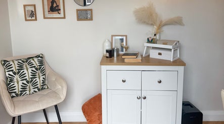 Stylish salon decor with cushioned chair at Nasa Nails, Craigavon, Northern Ireland, GB.