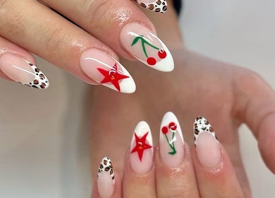 Unique cherry and star nail art at Nasa Nails, Craigavon, Northern Ireland, GB, offers playful elegance.