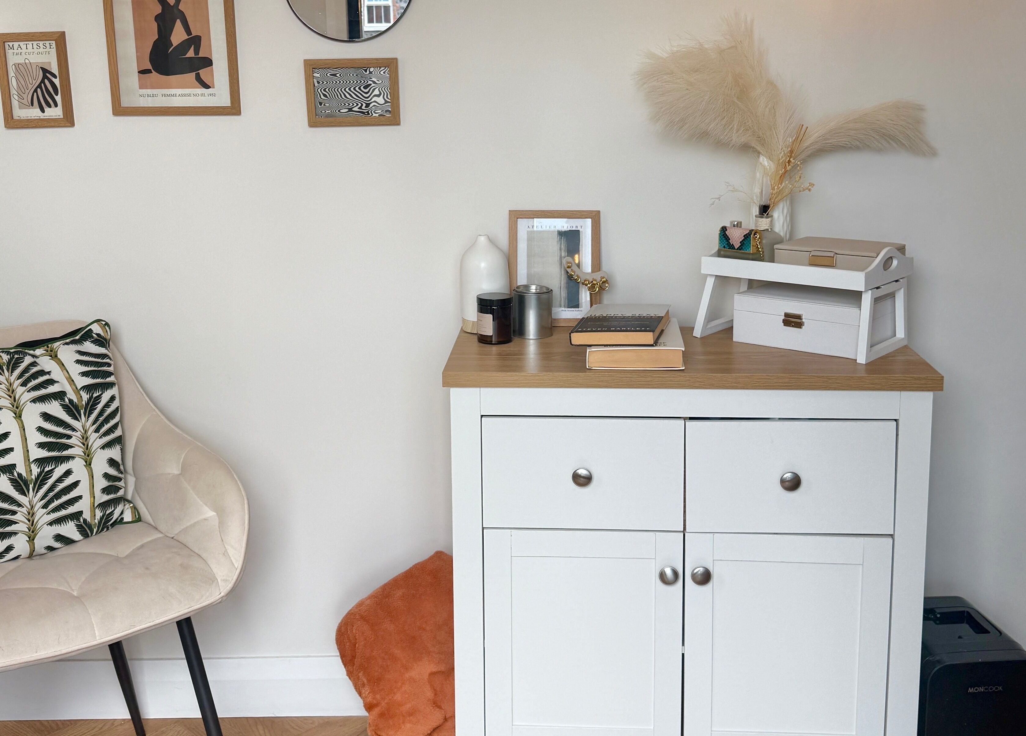 Cozy interior of Nasa Nails in Craigavon, Northern Ireland, GB with stylish decor and a comfy chair.