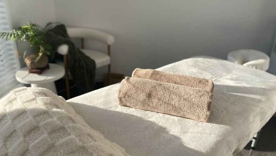 Knead To Relax massage room with plush towels in Regency Downs, Queensland, AU.