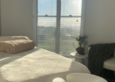 Tranquil massage room at Knead To Relax, Regency Downs, Queensland, AU, featuring a cozy massage table.