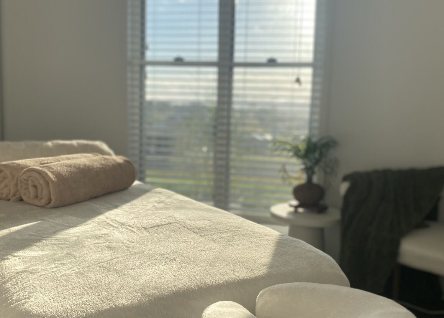 Tranquil massage room at Knead To Relax, Regency Downs, Queensland, AU, featuring a cozy massage table.