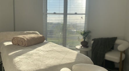 Tranquil massage room at Knead To Relax, Regency Downs, Queensland, AU, featuring a cozy massage table.