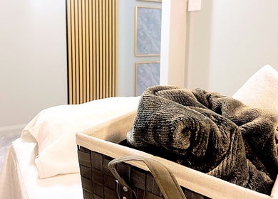 Relaxing spa bed with plush towels at Opulence Serenity, Subiaco, Western Australia, AU.