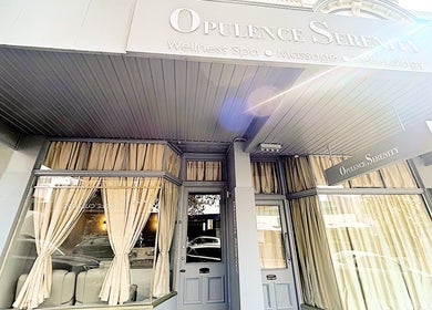 Front view of Opulence Serenity spa in Subiaco, Western Australia, AU with elegant curtains and signage.