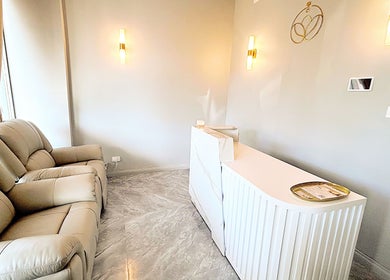 Luxurious reception area at Opulence Serenity, Subiaco, Western Australia, AU with plush seating and warm lighting.