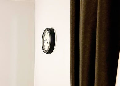 Classic wall clock at Opulence Serenity, enhancing the calm ambiance in Subiaco, Western Australia, AU.